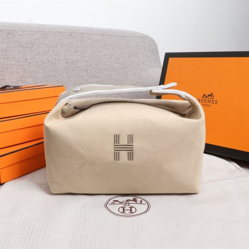 H**mes clutch bags